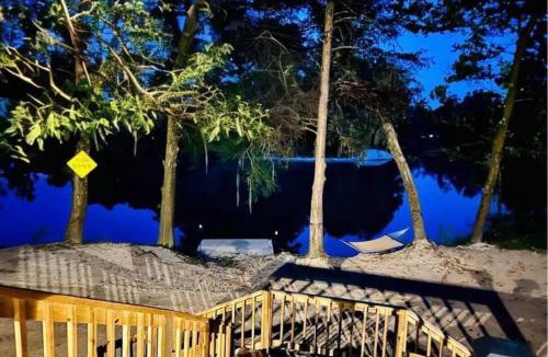 Modeste House | Secluded Riverside Oasis Private Deck Dock