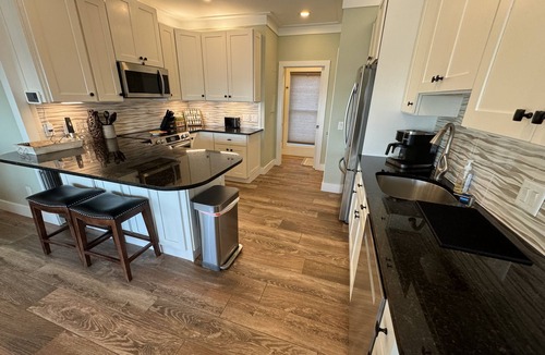 Navarre Beach House | “Semi-Retired”-Elevator-Pier-200+ 5 Star Reviews-Toys-Golf Cart Rental -EV Charg