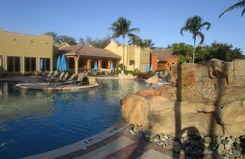 Bonita Springs Condo | SERENE VIEWS FROM 24' Lanai view lake/golf , coach home 1st floor.