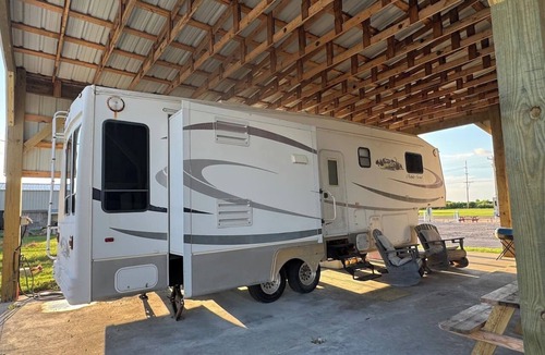 Holly Beach House | Short walk to the beach! This camper & cabin offer a perfect getaway!