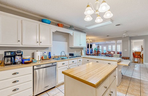 Saltillo House | Single-story home with private deck, grill, fireplace, & W/D