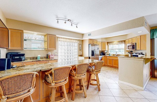 Isla del Sol House | Snowbird friendly townhouse near downtown with heated pool hot tub grill golf