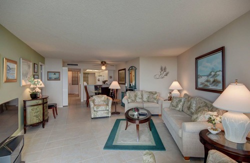 Marco Island Condo | South Seas Tower 4 #701 Looking at Sunset. Decorated with light pastel décor.