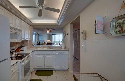 Marco Island Condo | South Seas Tower 4 #701 Looking at Sunset. Decorated with light pastel décor.