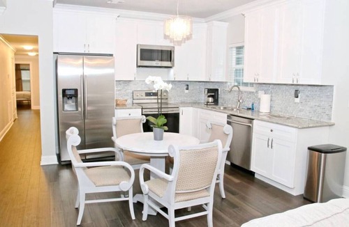 Tulane - Gravier Apartment | Spacious 3BR Mid-City stay 0.9 mi to Superdome. 2 kings, 1 queen, chef’s kitchen, Wi-Fi, steps to streetcar.