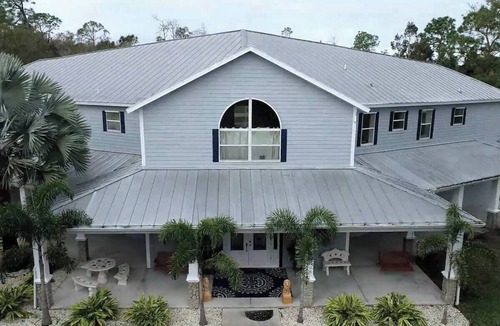 Biggar House | Spacious 4-bedroom estate Pool, Lake, centrally located Fort Myers