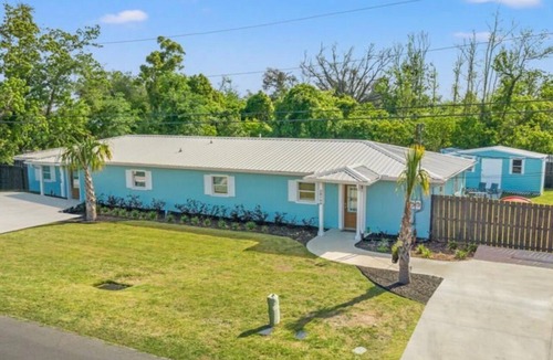 Highland City House | "Spacious 5-Bedroom Home with Versatile Living Areas and Private Pool