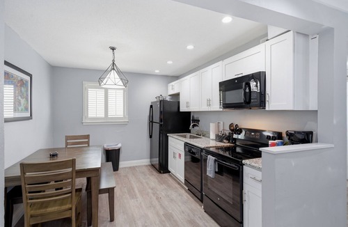 Faubourg Marigny Apartment | Spacious 8BR Frenchmen Street stay with pool, hot tub, parking, and easy access to the French Quarter and live music.