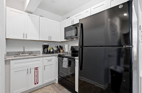 Faubourg Marigny Apartment | Spacious 8BR Frenchmen Street stay with pool, hot tub, parking, and easy access to the French Quarter and live music.