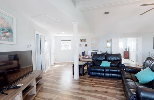 Royal Lagoons House | Spacious bay front getaway with dock, canal access, gas grill, & furnished deck