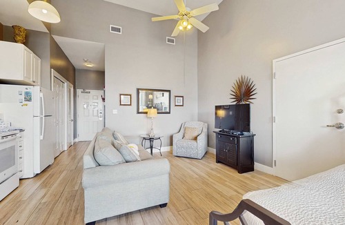 Gulf Place Apartment | Spacious condo with large living area, private balcony & shared pool