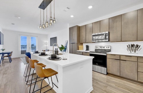 Birmingham Apartment | Spacious Oasis w/Pool, Gym, & Stunning City Views