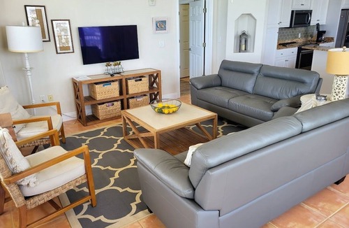 Thomas Drive Condo | Spectacular 3-bedroom; Wrap-around balcony; Gulf Front; Beach Set up Included!