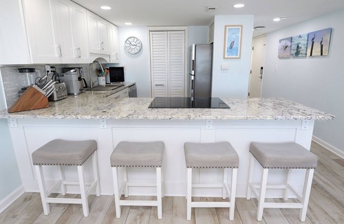 Sunnyside Condo | Steps to sand with wraparound gulf-front balcony