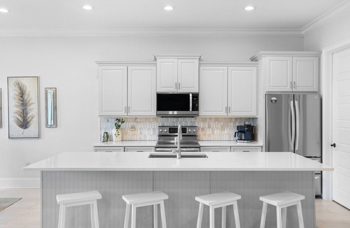 Villa Lago House | Stunning 4BR Beach Villa! 2 GOLF CARTS. Steps to Pool. Beach Tram. Near Wharf