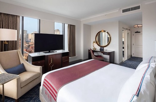Arts/Warehouse District Hotel | Stylish Comfort With Private Balcony, A Short Drive to Arts Warehouse District!