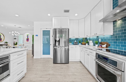 Coral Shores House | Stylish Modern Tropical Waterway Retreat with Private Pool Near Beaches!