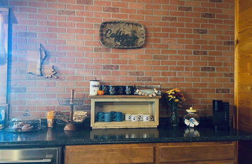 Oscar Cabin | Sugar Cane Cottage is cozy with a country feeling.