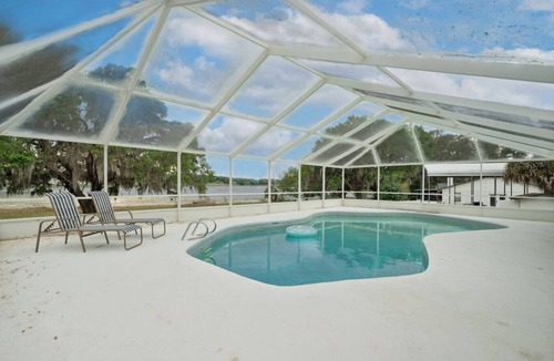 Fruitland Park House | Sunny Lakeside Retreat w/Pool + Firepit
