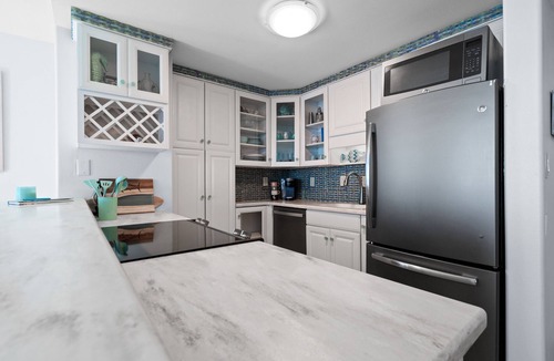 Villa Sabine Condo | Sunset Bay Views! 3BR Condo with Pool, Dock and Beach Access