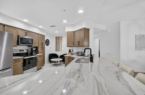 Tropical Cove Condo | The Coastal Gem at Lexington CC Lake Village