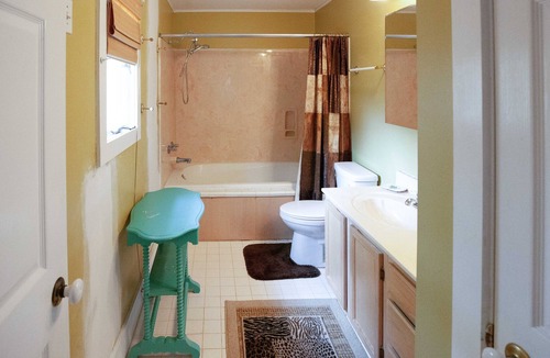Santa Rosa Beach House | The Cottage By The Canal | Sunroom & Patio | 5 Minutes to Gulf & Restaurants