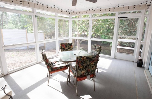 Santa Rosa Beach House | The Cottage By The Canal | Sunroom & Patio | 5 Minutes to Gulf & Restaurants
