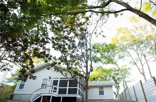 Santa Rosa Beach House | The Cottage By The Canal | Sunroom & Patio | 5 Minutes to Gulf & Restaurants