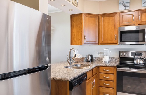 Holiday Isle Condo | The Islander 717 Don't Worry Beach Happy! Free Beach Service - Heated Pool