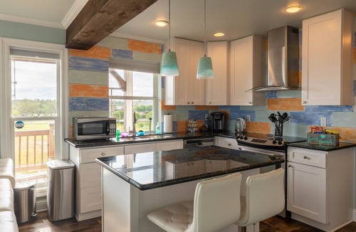 Long Beach House | The Nest - A waterfront cottage sitting high above the tree tops