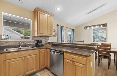 Lynn Haven House | The Splash Pad Sleeps 13 w Pool Patio and Garage