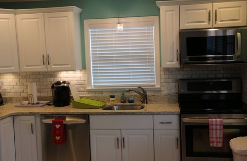 Lower Grand Lagoon House | This adorable cottage is DIRECTLY ON THE BEACH-RARE FIND!