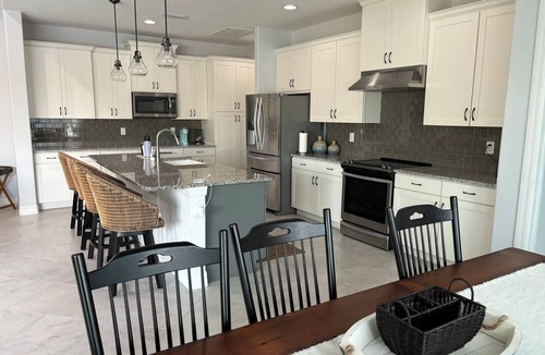 South Gulf Cove House | THREE PALMS PARADISE! Modern, 3-Bedroom Home, that sleeps 12. Port Charlotte, FL
