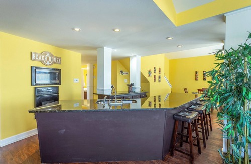Alligator Point House | Tiki House is a Unique Beach Front gathering spot for family, friends and PUPs.