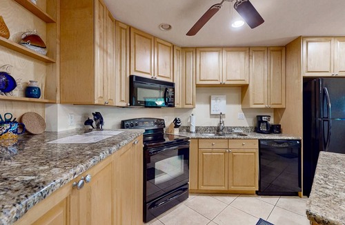 Tierra Verde Condo | Top floor Condo with on site pool hot tub grills gym and private balcony