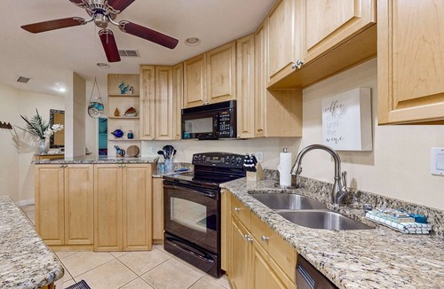 Tierra Verde Condo | Top floor Condo with on site pool hot tub grills gym and private balcony