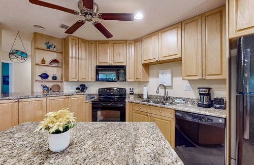 Tierra Verde Condo | Top floor Condo with on site pool hot tub grills gym and private balcony