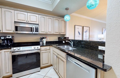 Four Mile Village Condo | Tops'l Summit 913 Great pool, hot tub, close to beach, private resort