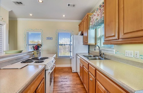 Sea Palm Village House | TRADEWINDS HAS LONG BEEN praised as a uniquely appointed home where treasured memories are made.