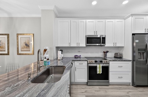 Tropical Cove Condo | Tranquil Waters at Lexington CC Lake Village