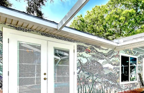 Sebastian Highlands House | Tropical Oasis on double lot w/Pool, Pond, King Bed & Mosaics- Pet Friendly!