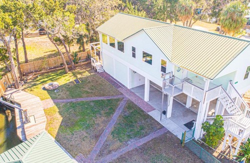 Crystal River House | Twin Heron Hideaway on Ozello Trail on a deep water canal, hot tub, kayaks, firepit, sleeps 6.