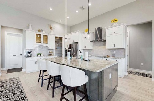 Edgewater House | Ultimate waterside retreat with private dock, lanai, pool & spa, BBQ and WiFi