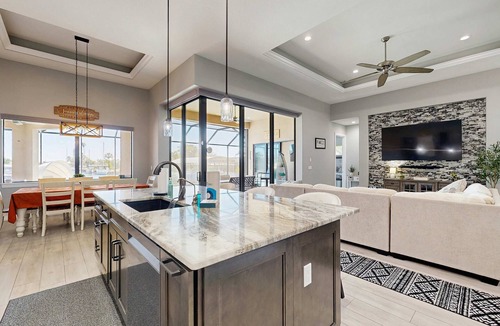 Edgewater House | Ultimate waterside retreat with private dock, lanai, pool & spa, BBQ and WiFi