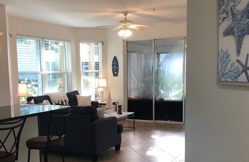 Tropical Cove Condo | Updated 3 bdrm 2 bath condo in a beautiful gated secure Golf/Tennis Community.