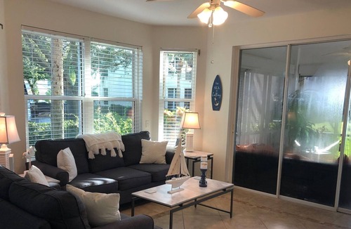 Tropical Cove Condo | Updated 3 bdrm 2 bath condo in a beautiful gated secure Golf/Tennis Community.