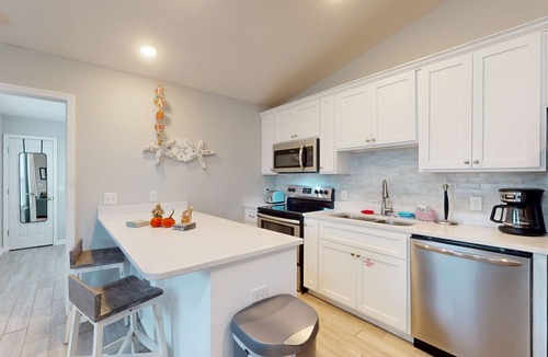 Treasure Cove House | Updated duplex with private yard, patio, updated interior, & great location