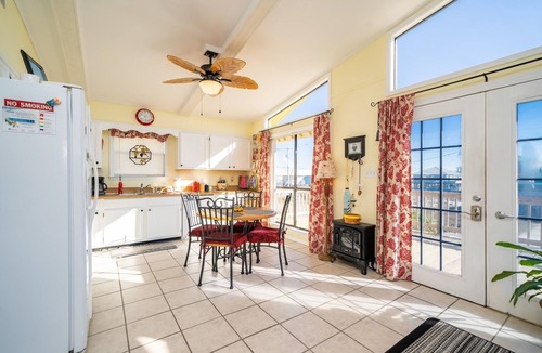 Fort Morgan House | Vacation home with a hot tub, steps from Fort Morgan Beach