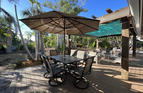 Sanibel House | Walk to the Beach! Cozy Restored Island Getaway