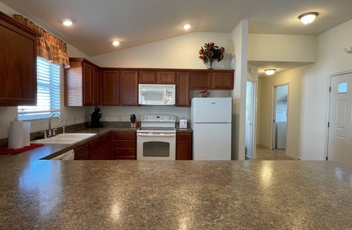 Lake Sumter Landing House | Walking distance to Lake Sumter Landing! Small Dog Friendly Villa w/Golf Cart